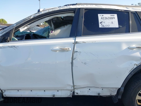 2018 Toyota RAV4 XLE with VIN 2T3WFREV3JW484955, listed as a IAAI auction lot 42262089 with 118,527 mi miles and . Bid and sale history available at DreamBid. Image 15.