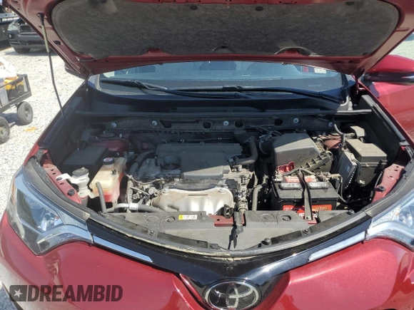 2018 Toyota RAV4 XLE with VIN JTMWFREV7JD119143, listed as a Copart auction lot 52576915 with 56,947 mi miles and Salvage Title. Bid and sale history available at carsss.com. Image 12.