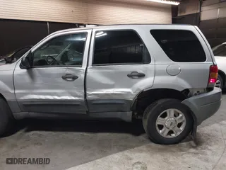 2004 Ford Escape XLT with VIN 1FMYU03164KA95424, listed as a IAAI auction lot 41810929 with 229,539 mi miles. Bid and sale history available at carsss.com. Image 19.