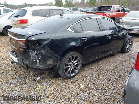 2017 Mazda 6 Grand Touring with VIN JM1GL1X54H1131788, listed as a IAAI auction lot 41640785 with 181,561 mi miles. Bid and sale history available at carsss.com. Image 4.
