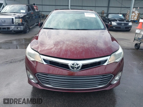 2014 Toyota Avalon Limited with VIN 4T1BK1EB3EU113035, listed as a IAAI auction lot 42040239 with 118,609 mi miles. Bid and sale history available at carsss.com. Image 11.