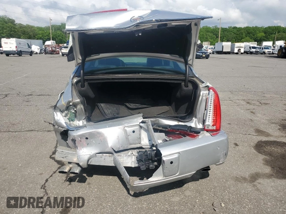 2009 Cadillac DTS 1SA z VIN 1G6KD57Y19U136085, wystawiony jako Copart lot #56983425 z przebiegiem 115 468 mil mil oraz Czysty tytuł • Clean title. Historia ofert i sprzedaży dostępna na DreamBid. Obrazek 6.