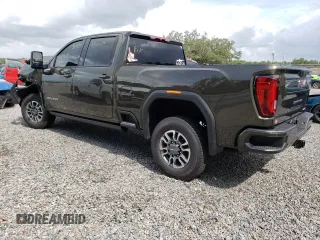 2023 GMC Sierra 3500HD AT4 z VIN 1GT49VEY3PF127108, wystawiony jako Copart lot #57052823 z przebiegiem 9915 mil mil oraz Szkody całkowita. Historia ofert i sprzedaży dostępna na DreamBid. Obrazek 2.