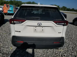 2022 Toyota RAV4 XLE with VIN 2T3W1RFV9NW215670, listed as a Copart auction lot 50312135 with 52,808 mi miles and Salvage Title. Bid and sale history available at carsss.com. Image 6.