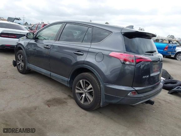 2018 Toyota RAV4 XLE with VIN JTMWFREV4JJ742463, listed as a IAAI auction lot 41920716 with 61,141 mi miles. Bid and sale history available at carsss.com. Image 3.