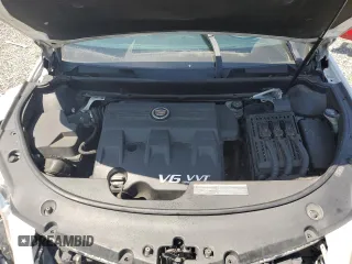 2014 Cadillac SRX z VIN 3GYFNAE32ES543932, wystawiony jako Copart lot #54256435 z przebiegiem 169 621 mil mil oraz Szkoda całkowita • Salvage title. Historia ofert i sprzedaży dostępna na DreamBid. Obrazek 12.