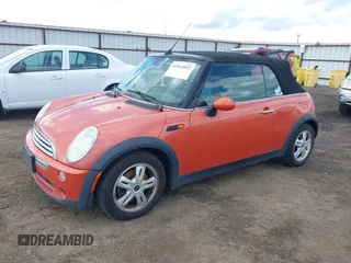 2006 MINI Convertible with VIN WMWRF33546TF65857, listed as a IAAI auction lot 41814032 with 91,736 mi miles and . Bid and sale history available at DreamBid. Image 2.