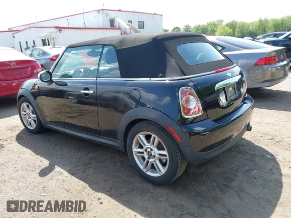 2011 MINI Convertible with VIN WMWZN3C56BT132924, listed as a IAAI auction lot 42161363 with 133,444 mi miles and . Bid and sale history available at DreamBid. Image 3.