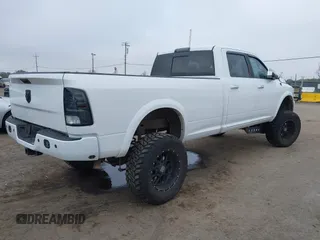 2014 Ram 2500 with VIN 3C6TR5KT3EG309771, listed as a IAAI auction lot 41213964 with 136,617 mi miles and . Bid and sale history available at DreamBid. Image 4.