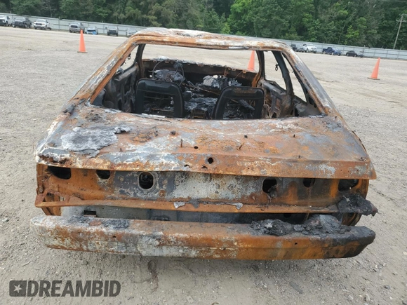 1987 Ford Mustang with VIN 1FABP41A5HF135072, listed as a Copart auction lot 57586605 with Not provided miles and Salvage title. Bid and sale history available at DreamBid. Image 6.