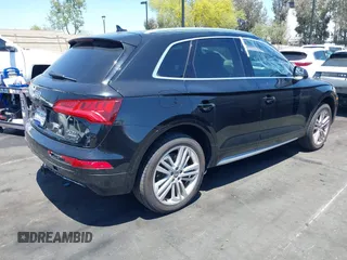 2018 Audi Q5 Premium Plus z VIN WA1BNAFY7J2094777, wystawiony jako IAAI lot #42265300 z przebiegiem Nie podano mil oraz . Historia ofert i sprzedaży dostępna na DreamBid. Obrazek 4.
