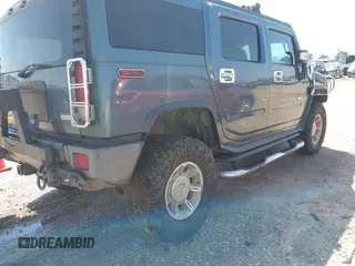 2006 Hummer H2 with VIN 5GRGN23U56H101246, listed as a IAAI auction lot 41759368 with 315,690 mi miles. Bid and sale history available at carsss.com. Image 4.