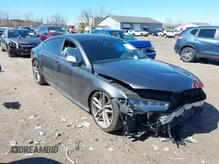 2016 Audi S7 with VIN WAUW2AFCXGN104680, listed as a IAAI auction lot 41803616 with 125,047 mi miles. Bid and sale history available at carsss.com. Image 1.