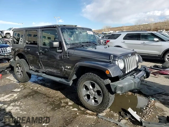 2017 Jeep Wrangler Unlimited Sahara with VIN 1C4HJWEG4HL615069, listed as a Copart auction lot 46480225 with 104,723 mi miles and Salvage title. Bid and sale history available at DreamBid. Image 14.