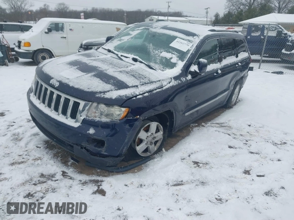 2013 Jeep Grand Cherokee Laredo with VIN 1C4RJFAGXDC542987, listed as a IAAI auction lot 41262770 with 199,273 mi miles. Bid and sale history available at carsss.com. Image 17.