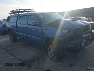 2015 Toyota Tacoma with VIN 3TMMU4FN7FM079866, listed as a IAAI auction lot 41618881 with 165,268 mi miles. Bid and sale history available at carsss.com. Image 1.