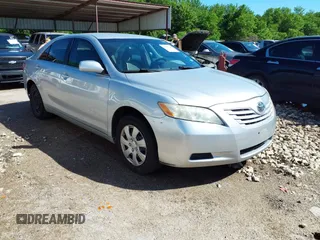 2007 Toyota Camry CE with VIN 4T1BE46K07U015770, listed as a IAAI auction lot 42081281 with 229,744 mi miles. Bid and sale history available at carsss.com. Image 1.