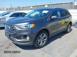 2019 Ford Edge SEL with VIN 2FMPK3J9XKBB76512, listed as a IAAI auction lot 42498683 with 119,513 mi miles and . Bid and sale history available at DreamBid. Image 2.