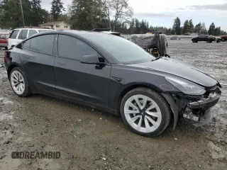 2023 Tesla Model 3 Long Range with VIN 5YJ3E1EB9PF607217, listed as a Copart auction lot 50103645 with 82,198 mi miles and Salvage Title. Bid and sale history available at DreamBid. Image 4.