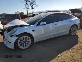 2021 Tesla Model 3 Standard Range Plus with VIN 5YJ3E1EA0MF017765, listed as a Copart auction lot 42776525 with 54,873 mi miles and Salvage Title. Bid and sale history available at carsss.com. Image 1.