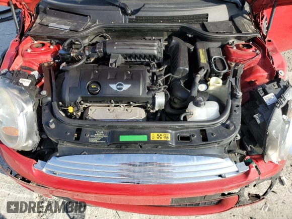 2007 MINI Hardtop z VIN WMWMF33547TT54263, wystawiony jako Copart lot #53400615 z przebiegiem 66 067 mil mil oraz Szkoda całkowita • Salvage title. Historia ofert i sprzedaży dostępna na DreamBid. Obrazek 12.