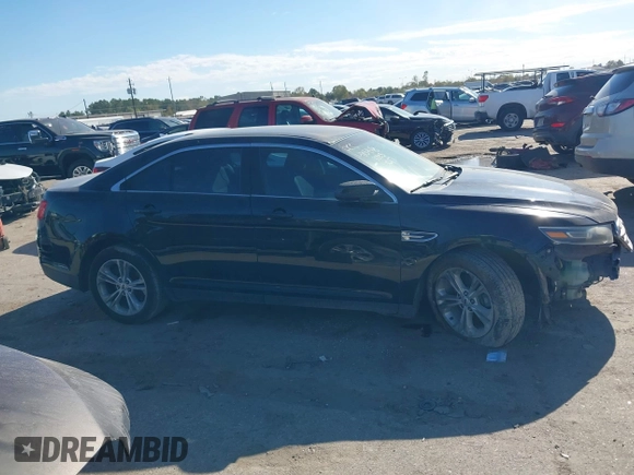 2014 Ford Taurus SEL z VIN 1FAHP2E84EG170133, wystawiony jako IAAI lot #41045369 z przebiegiem 261 732 mil mil oraz . Historia ofert i sprzedaży dostępna na DreamBid. Obrazek 14.