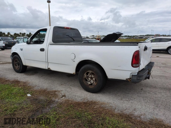 2003 Ford F-150 XL with VIN 1FTRF17W03NA02988, listed as a Copart auction lot 77209084 with Not Provided miles and Salvage Title. Bid and sale history available at DreamBid. Image 2.
