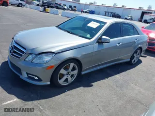 2010 Mercedes-Benz E-Class E 350 Luxury with VIN WDDHF5GBXAA022398, listed as a IAAI auction lot 42011533 with 167,763 mi miles. Bid and sale history available at carsss.com. Image 2.