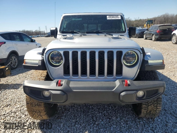 2023 Jeep Gladiator Rubicon with VIN 1C6JJTBG6PL579895, listed as a Copart auction lot 49588395 with 22,066 mi miles and Salvage title. Bid and sale history available at DreamBid. Image 5.
