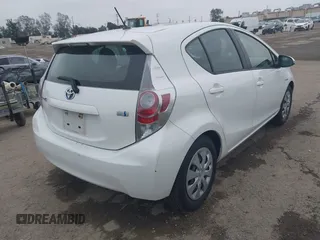 2014 Toyota Prius One with VIN JTDKDTB37E1559827, listed as a IAAI auction lot 42100986 with 44,155 mi miles and . Bid and sale history available at DreamBid. Image 4.