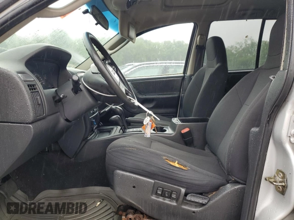 2004 Jeep Grand Cherokee Laredo z VIN 1J4GW48S74C288625, wystawiony jako Copart lot #61290805 z przebiegiem 194 615 mil mil oraz Czysty tytuł • Clean title. Historia ofert i sprzedaży dostępna na DreamBid. Obrazek 7.