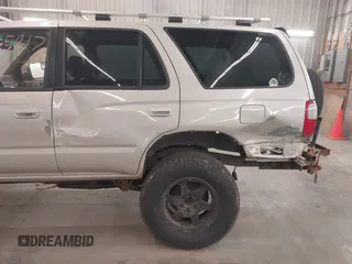 1998 Toyota 4Runner SR5 with VIN JT3HN86R1W0180174, listed as a IAAI auction lot 42065817 with 252,961 mi miles and . Bid and sale history available at DreamBid. Image 6.