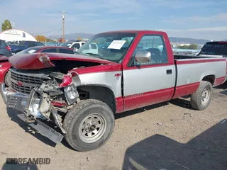 1992 Chevrolet C/K 1500 with VIN 1GCEK14K7NE106585, listed as a IAAI auction lot 40571156 with 148,563 mi miles. Bid and sale history available at carsss.com. Image 2.