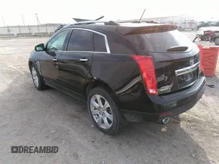 2016 Cadillac SRX Performance Collection z VIN 3GYFNCE32GS505552, wystawiony jako IAAI lot #40949642 z przebiegiem 143 343 mil mil oraz . Historia ofert i sprzedaży dostępna na DreamBid. Obrazek 3.