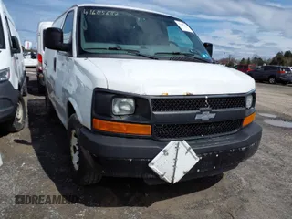 2014 Chevrolet Express Cargo Van with VIN 1GCWGFCA0E1205946, listed as a IAAI auction lot 41685687 with 317,212 mi miles. Bid and sale history available at carsss.com. Image 1.
