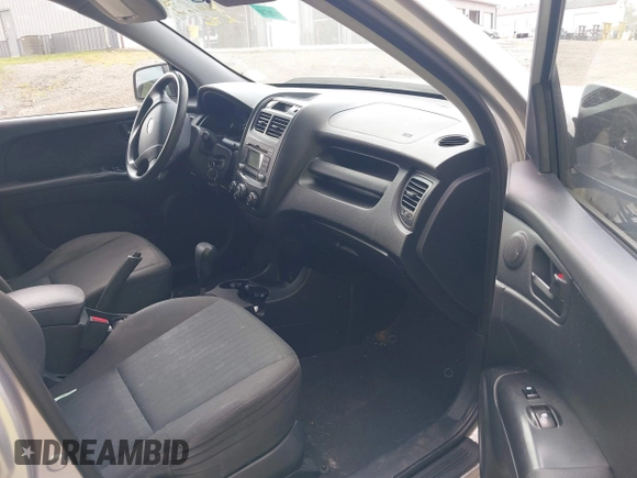 2009 Kia Sportage LX with VIN KNDJF724997633726, listed as a IAAI auction lot 39952246 with 201,090 mi miles and . Bid and sale history available at DreamBid. Image 5.