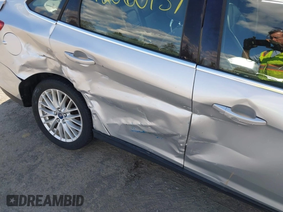 2012 Ford Focus SEL with VIN 1FAHP3H29CL151658, listed as a IAAI auction lot 42060139 with 149,547 mi miles and . Bid and sale history available at carsss.com. Image 6.