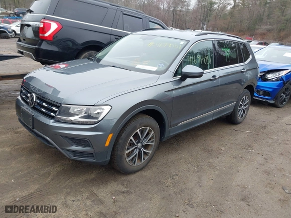 2020 Volkswagen Tiguan SE with VIN 3VV2B7AX2LM086678, listed as a IAAI auction lot 41694051 with 59,495 mi miles. Bid and sale history available at carsss.com. Image 2.