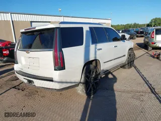 2016 Cadillac Escalade Premium Collection with VIN 1GYS4CKJ4GR387558, listed as a IAAI auction lot 40447019 with 98,517 mi miles. Bid and sale history available at carsss.com. Image 4.