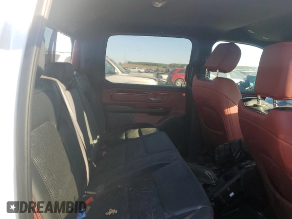 2019 Ram 1500 Rebel z VIN 1C6SRFLT8KN780527, wystawiony jako Copart lot #47611955 z przebiegiem Nie podano mil oraz Szkoda całkowita • Salvage title. Historia ofert i sprzedaży dostępna na DreamBid. Obrazek 10.