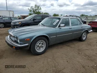1986 Jaguar XJ with VIN SAJAV1340GC433323, listed as a Copart auction lot 58348205 with 66,909 mi miles and Clean title. Bid and sale history available at DreamBid. Image 1.