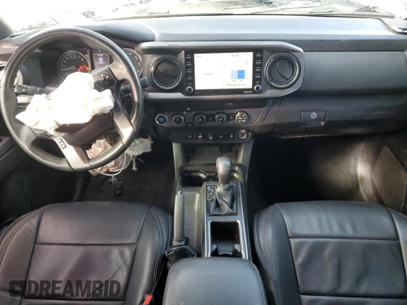 2020 Toyota Tacoma SR5 with VIN 3TMDZ5BN6LM097302, listed as a Copart auction lot 57503895 with 77,212 mi miles and Salvage title. Bid and sale history available at DreamBid. Image 8.