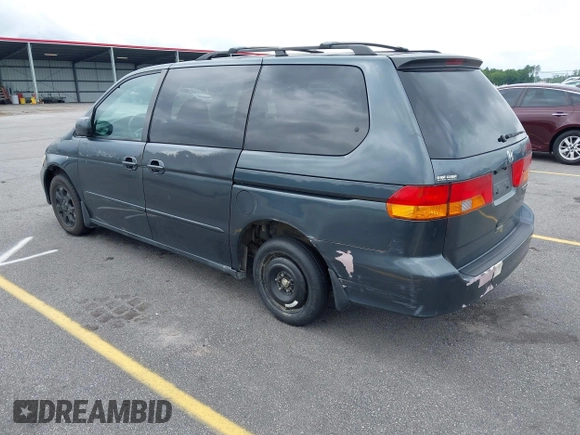 2003 Honda Odyssey EX-L with VIN 5FNRL18963B059910, listed as a IAAI auction lot 42415037 with 267,600 mi miles and . Bid and sale history available at DreamBid. Image 3.