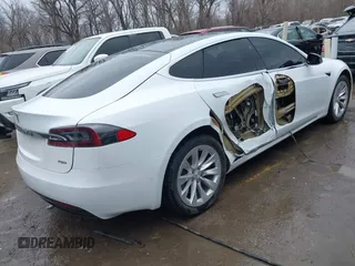 2018 Tesla Model S 75D with VIN 5YJSA1E2XJF274766, listed as a IAAI auction lot 41704600 with 164,066 mi miles and . Bid and sale history available at DreamBid. Image 4.