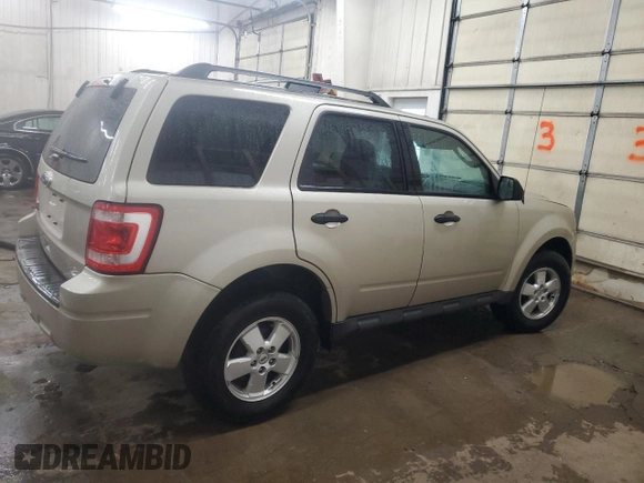 2012 Ford Escape XLT with VIN 1FMCU9D76CKC44981, listed as a Copart auction lot 57908795 with 127,594 mi miles and Salvage title. Bid and sale history available at DreamBid. Image 3.