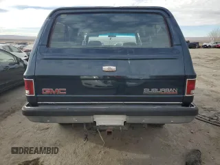 1989 GMC Suburban z VIN 1GKGV26K0KF517730, wystawiony jako Copart lot #41437715 z przebiegiem 21 423 mil mil oraz Szkody całkowita. Historia ofert i sprzedaży dostępna na DreamBid. Obrazek 6.
