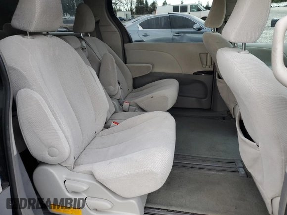 2012 Toyota Sienna with VIN 5TDKA3DC0CS014719, listed as a Copart auction lot 88358865 with 118,901 mi miles and Salvage Title. Bid and sale history available at DreamBid. Image 12.