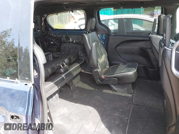 2023 Chrysler Pacifica Limited with VIN 2C4RC3GGXPR555282, listed as a IAAI auction lot 42452848 with 18,373 mi miles and . Bid and sale history available at DreamBid. Image 8.