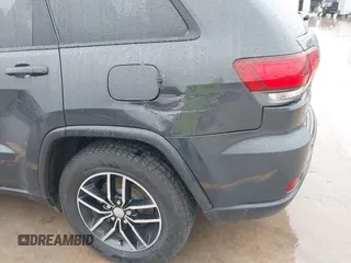 2018 Jeep Grand Cherokee Trailhawk with VIN 1C4RJFLG6JC320763, listed as a IAAI auction lot 41871683 with 115,417 mi miles and . Bid and sale history available at DreamBid. Image 6.