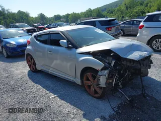 2013 Hyundai Veloster Turbo with VIN KMHTC6AE0DU095350, listed as a IAAI auction lot 42683056 with 108,269 mi miles and . Bid and sale history available at DreamBid. Image 1.